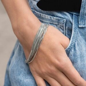 By a Show of Strands Silver Bracelet